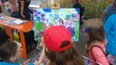 Kinder malen das Tesla-Bild am SAM-NT-Stand, Juni 2017